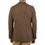 The back view of a man wearing a Studio 73 Brown Houndstooth Wool Cashmere Blazer.