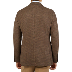 The back view of a man wearing a Studio 73 Brown Houndstooth Wool Cashmere Blazer.