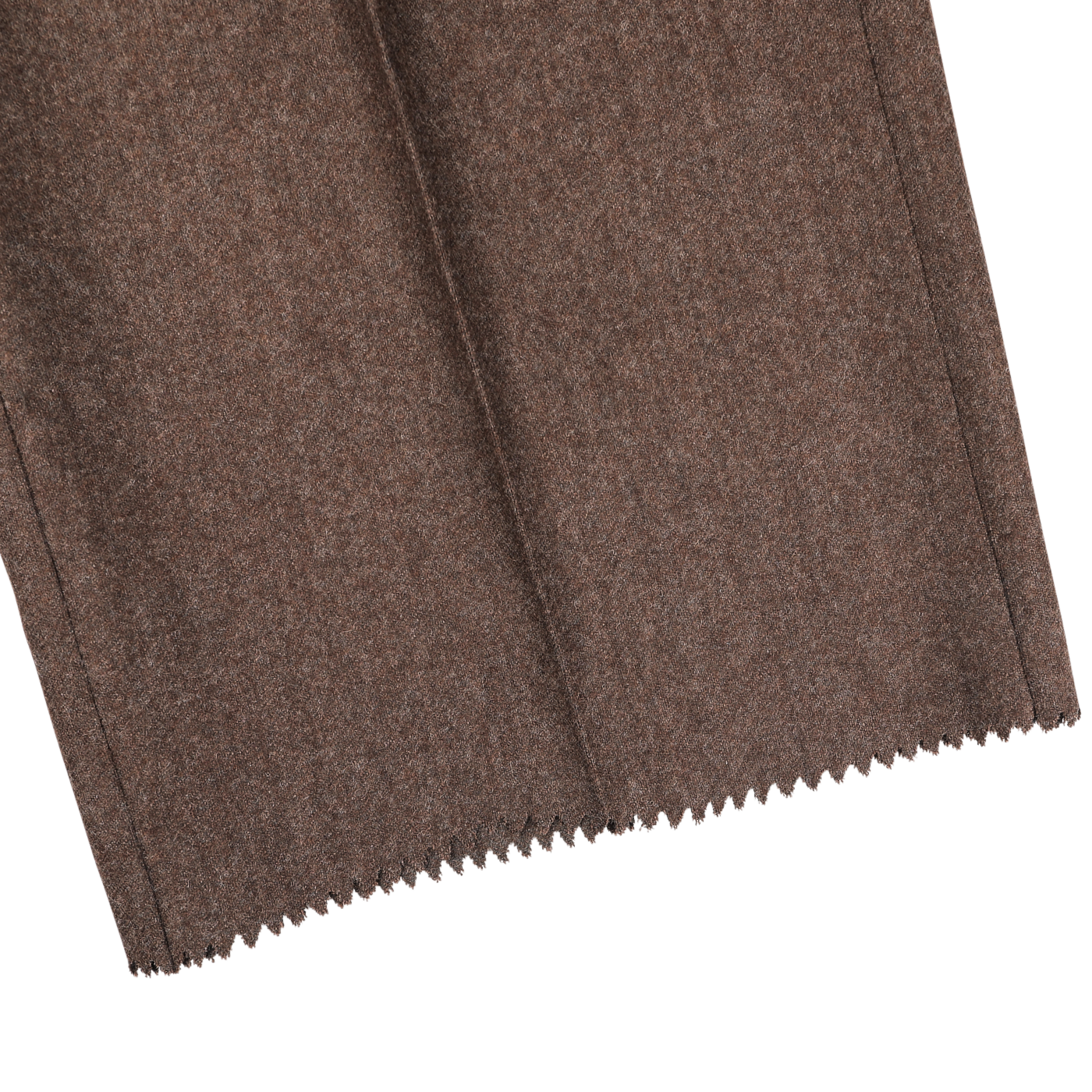 Close-up of the Brown Melange Wool Flannel Pleated Trousers by Studio 73, showcasing the soft texture reminiscent of pure wool flannel tailored trousers. The bottom edge features a distinctive zigzag cut.