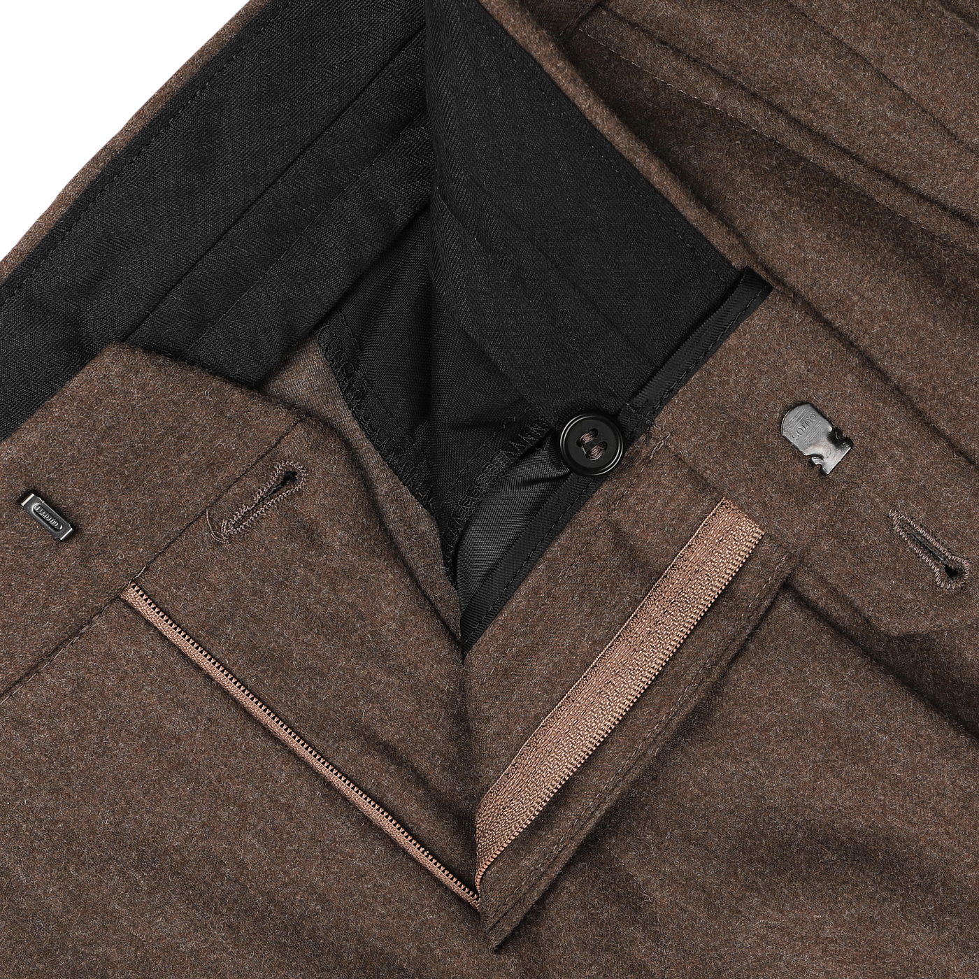 Close-up of the waistband of Studio 73's Brown Melange Wool Flannel Pleated Trousers, showcasing a visible zipper, black button, and clasp fastening. The high-waist design is crafted from pure wool flannel with a black interior lining.