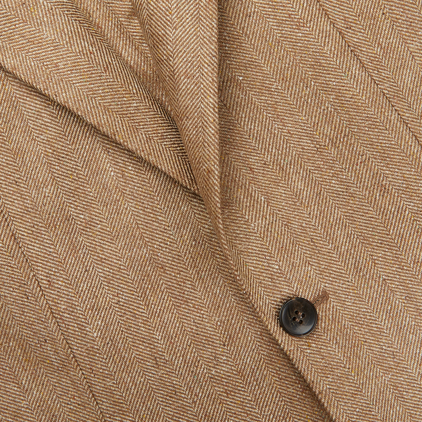 A close up of a Studio 73 Camel Brown Herringbone Pure Silk Blazer.