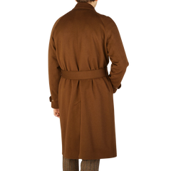 The back view of a man wearing Studio 73's Dark Brown Camel Wool Cashmere Raglan Coat.