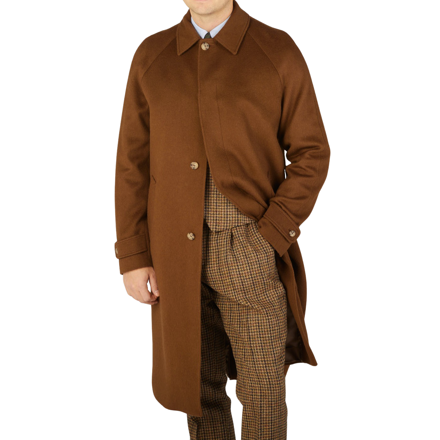A contemporary man wearing a Dark Brown Camel Wool Cashmere Raglan Coat from Studio 73.