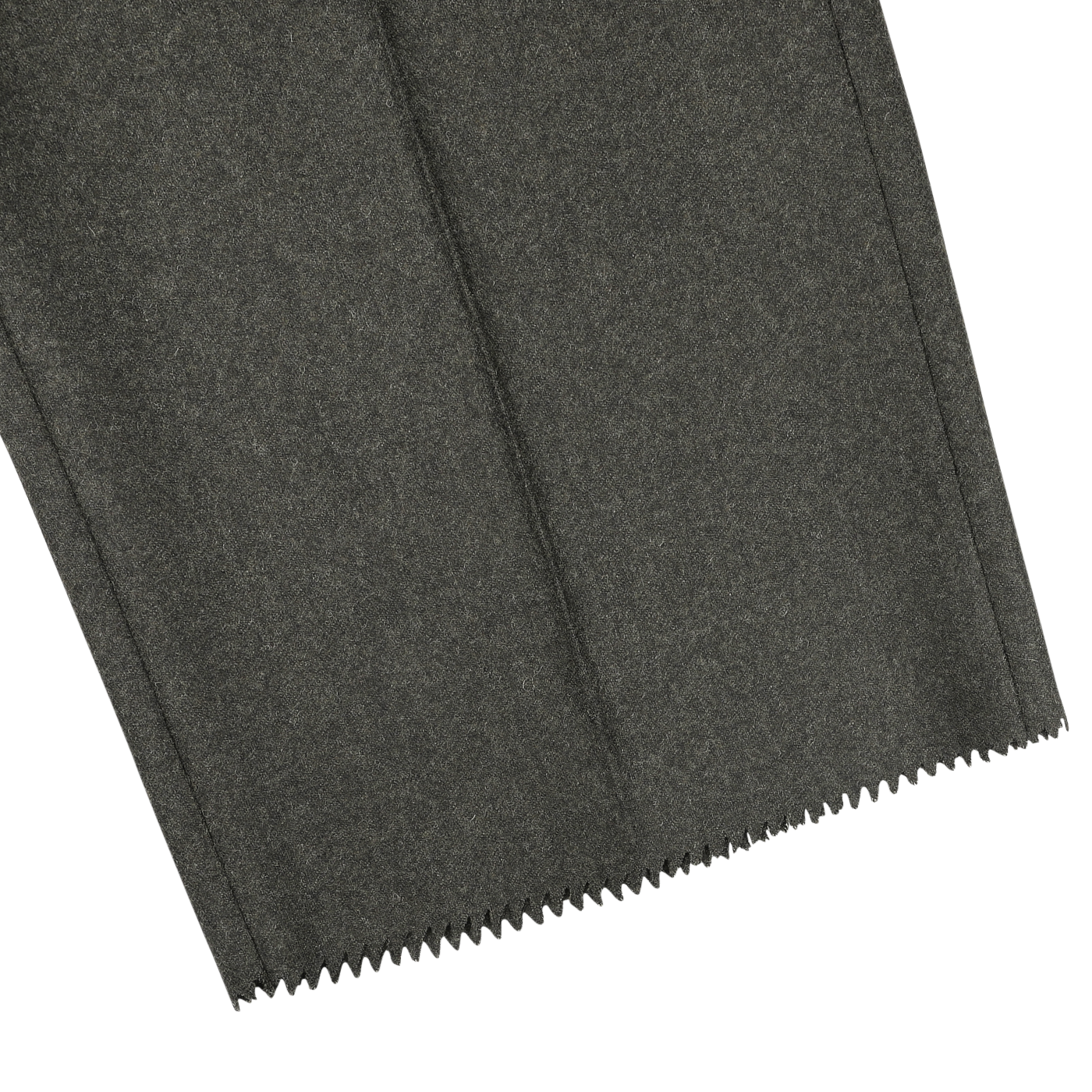 A close-up of the dark green fabric, featuring a zigzag cut hem that mirrors the refined texture characteristic of Studio 73's pure wool flannel Dark Green Wool Flannel Pleated Trousers, elegantly displayed on a white background.