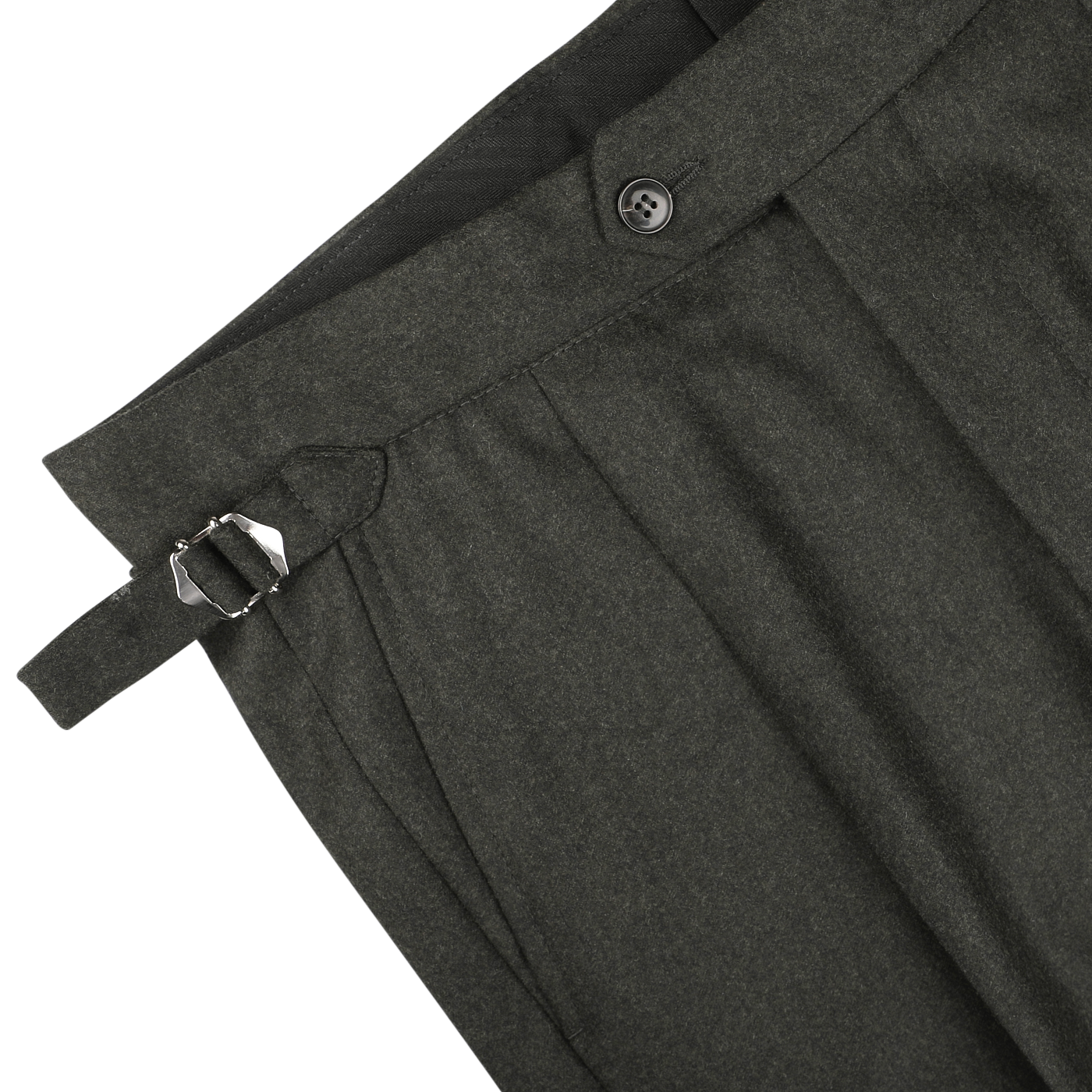 Close-up of the waistband of dark green wool flannel pleated trousers by Studio 73, featuring a single button, belt loops, and an adjustable side strap with a metal buckle.