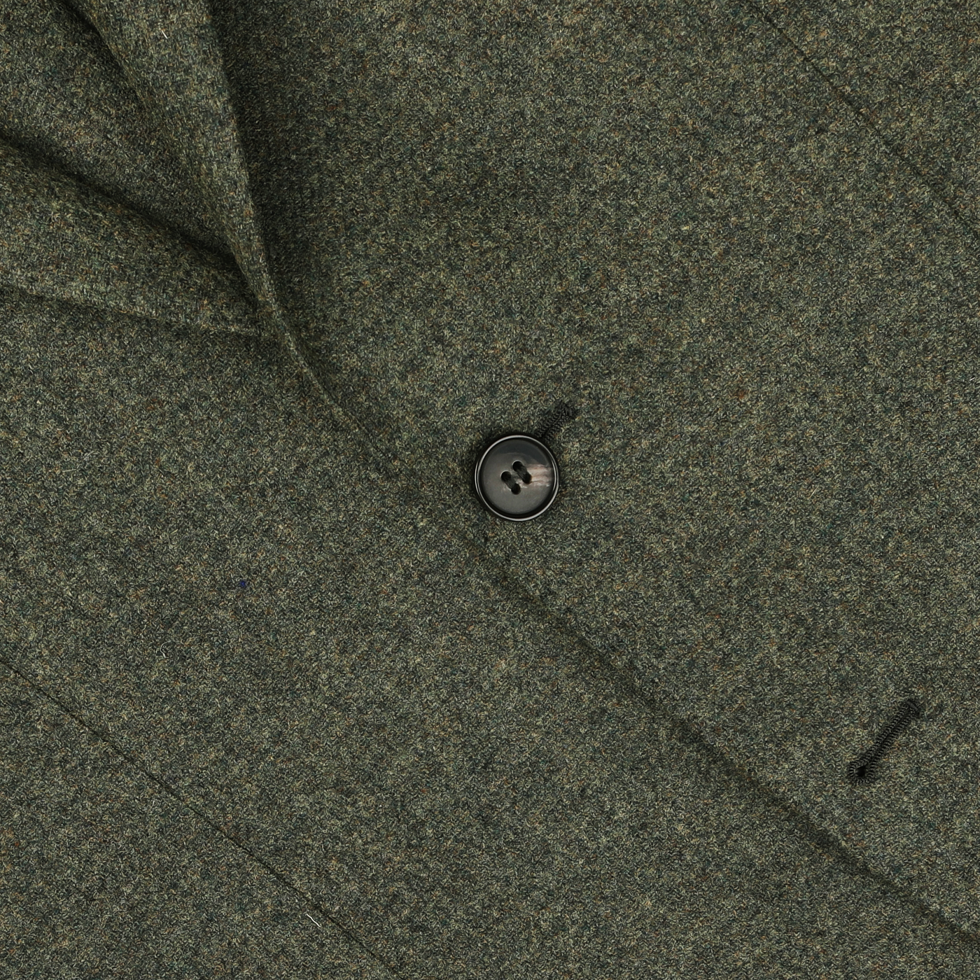 Close-up of the Studio 73 Green Melange Wool Tweed Blazer, highlighting a black button and buttonhole.