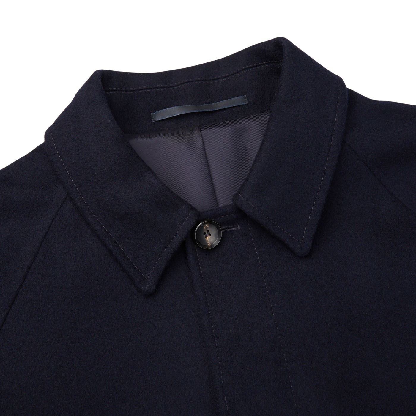 A close up of a Studio 73 navy wool cashmere raglan coat on a white background.