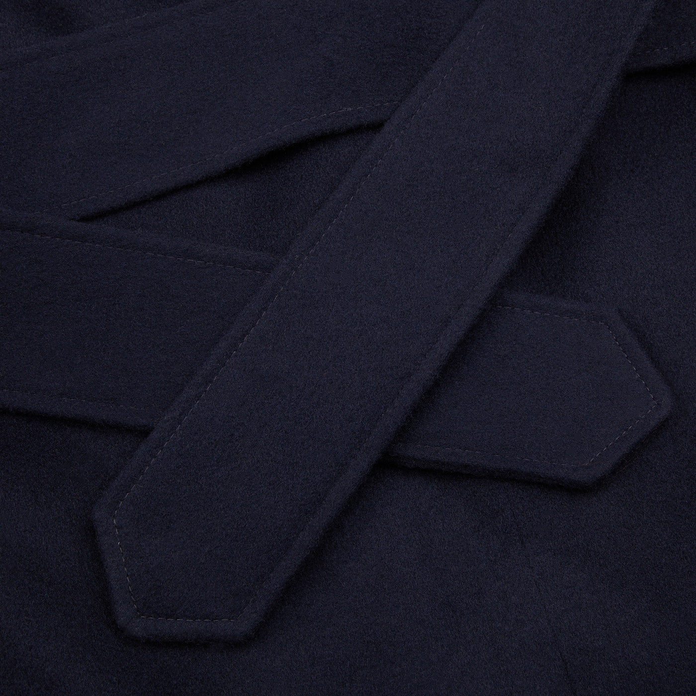 A close up of a Studio 73 Navy Wool Cashmere Raglan Coat.