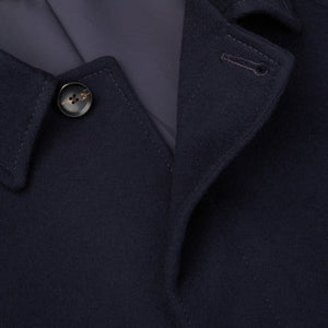 A close up of the collar of a Studio 73 Navy Wool Cashmere Raglan Coat.