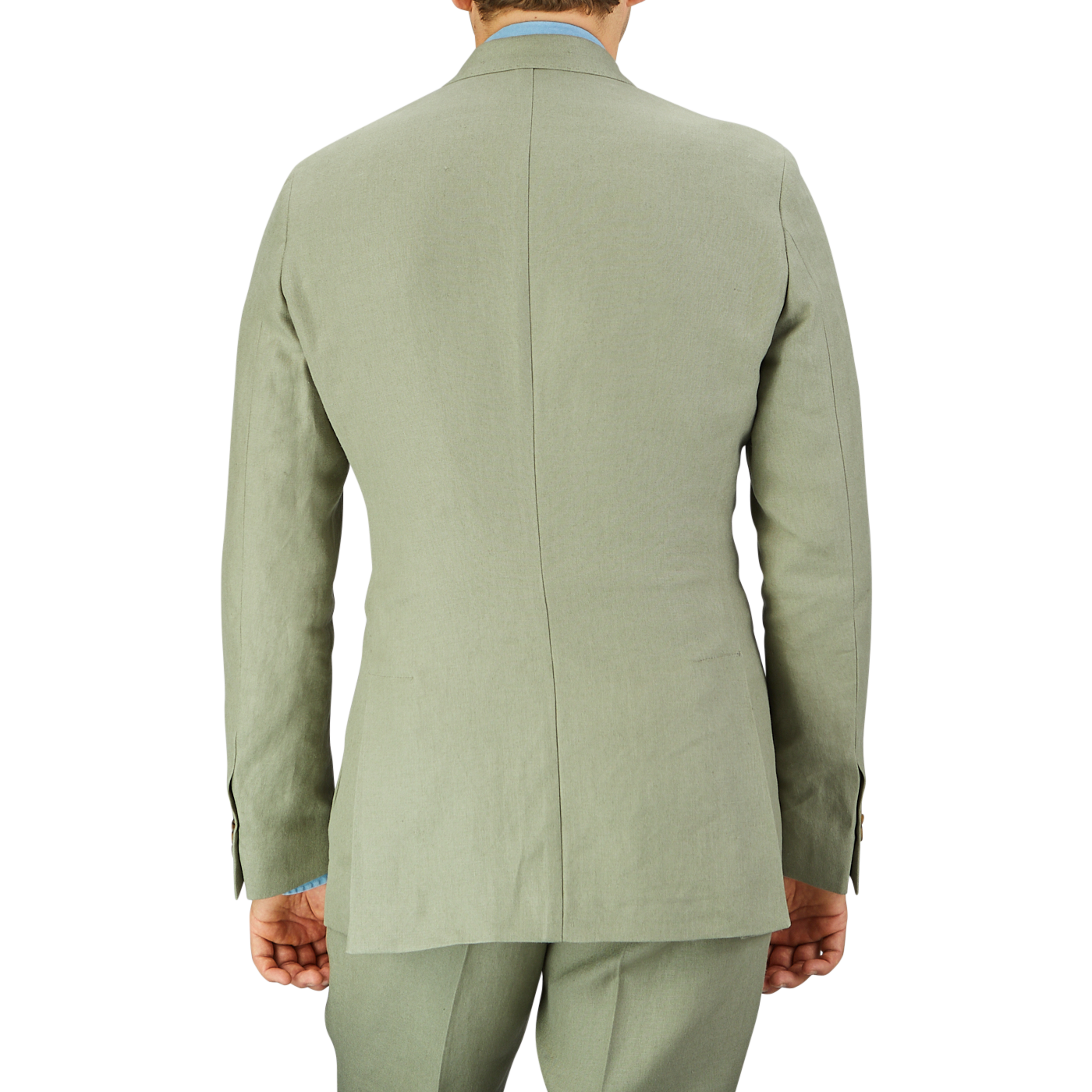 Person in a Sage Green Canapa Hemp DB Suit crafted from Studio 73's canapa hemp linen, viewed from the back.