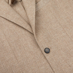 A close up of a Studio 73 taupe beige wool herringbone blazer with cashmere.