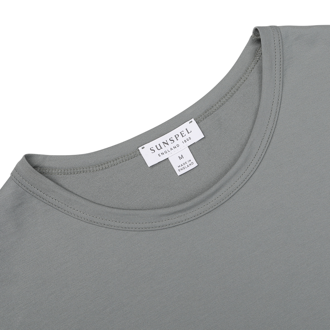 A close-up of a Sunspel Smoke Green Classic Cotton T-Shirt, showcasing the brand label on the neckline with size medium indicated. Crafted from premium cotton, this classic fit piece embodies timeless style and exceptional comfort.