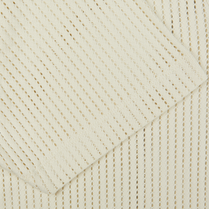 A close up of a Sunspel Ecru White Linear Cotton Mesh Polo Shirt.