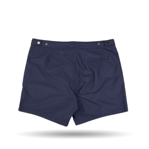 The Navy Blue Tailored Swim Shorts by Sunspel are made from recycled polyester, showing a stylish back view.