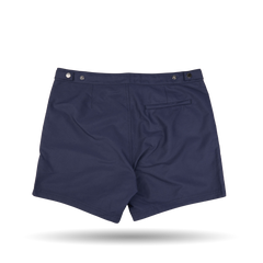 The Navy Blue Tailored Swim Shorts by Sunspel are made from recycled polyester, showing a stylish back view.