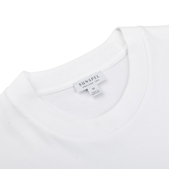 The Sunspel White Supima Cotton Relaxed Fit T-shirt, size medium, features a heavyweight design with a label inside the neckline.