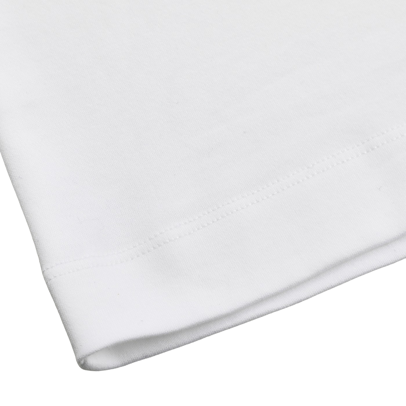 Close-up of the hem of a Sunspel White Supima Cotton Relaxed Fit T-shirt, elegantly resting on a light surface.