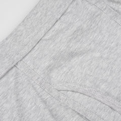 Close-up of a Grey Melange Pima Cotton Wil Trunks garment by The White Briefs featuring a seam and a pocket, made from organic pima cotton.