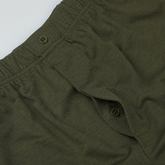 Close-up of the waistband and button-fly area of a pair of Olive Lyocell Cotton Henner Boxers from The White Briefs collection.