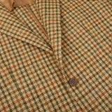 A close up of a Beige Houndstooth Wool Tweed Vesuvio Blazer made of virgin wool by Tagliatore.