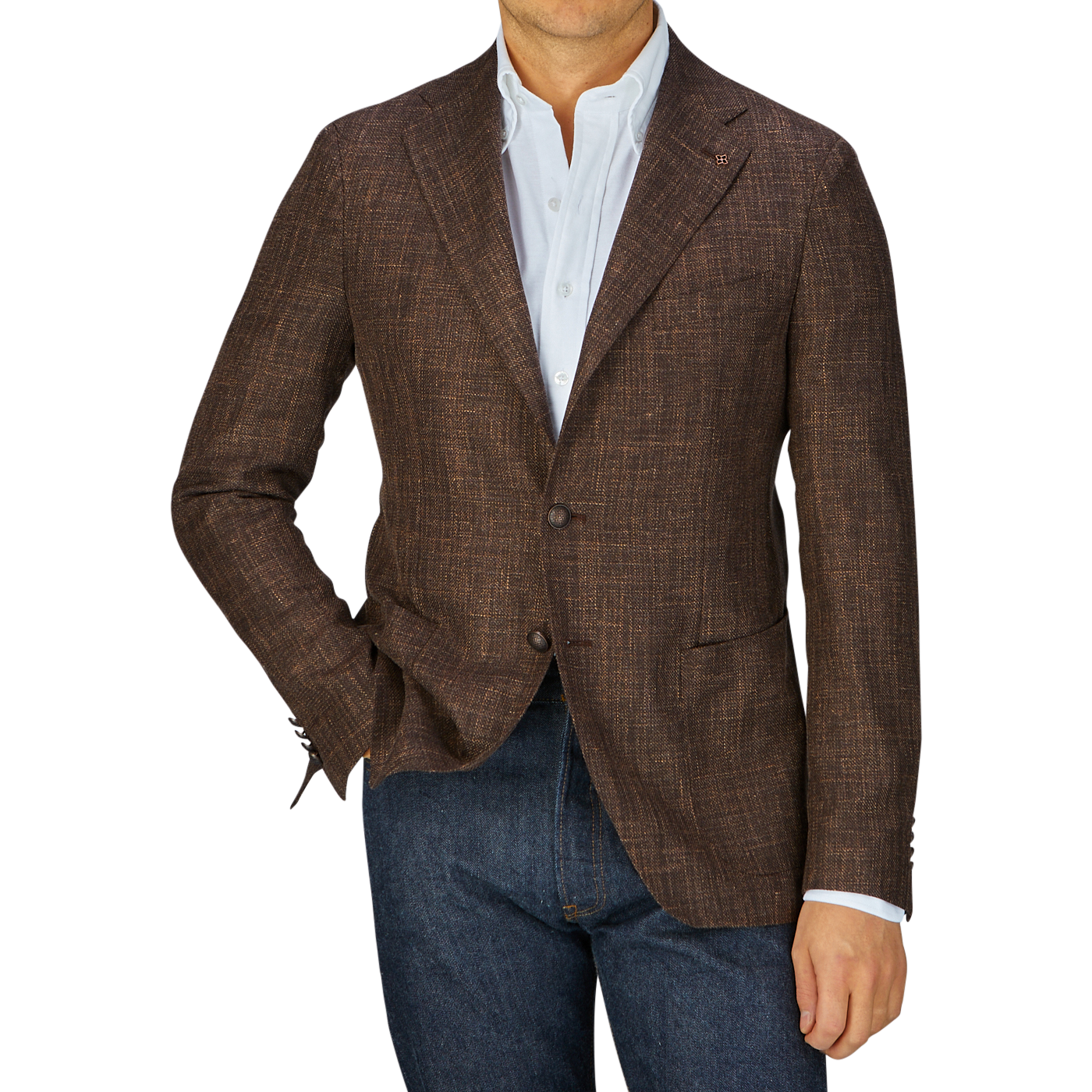 Man in a Tagliatore Dark Brown Melange Wool Linen Silk Blazer and blue jeans with a white shirt, hands in pockets, cropped at the neck.