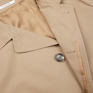 A close up image of a Tagliatore Khaki Beige Cotton Nylon Trench Coat in slim fit.