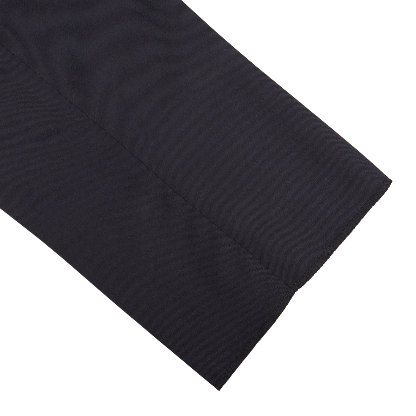 A close up of Tagliatore Midnight Navy Super 110s Wool Pleat Trousers on a white surface.