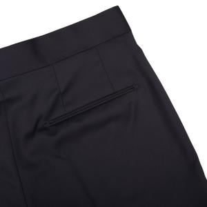 A close up view of Tagliatore Midnight Navy Super 110s Wool Pleat Trousers.