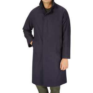 A man wearing a Tagliatore Navy Blue Cotton Nylon Trench Coat.