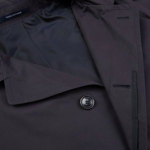 A close up of a Tagliatore Navy Blue Cotton Nylon Trench Coat.