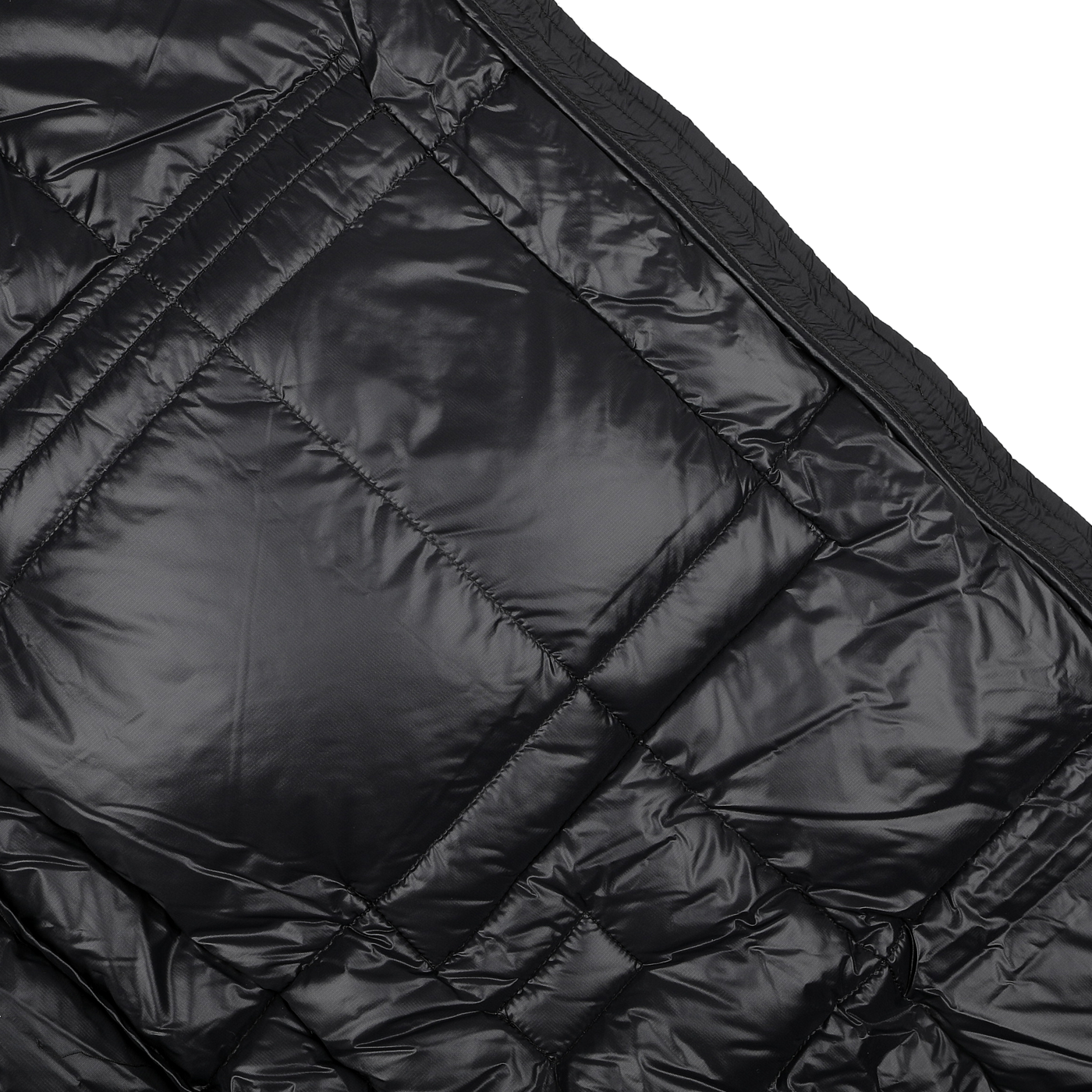 Close-up of the Taion Black Nylon Down Padded Parka, showcasing its shiny nylon exterior and detailed quilted stitching.