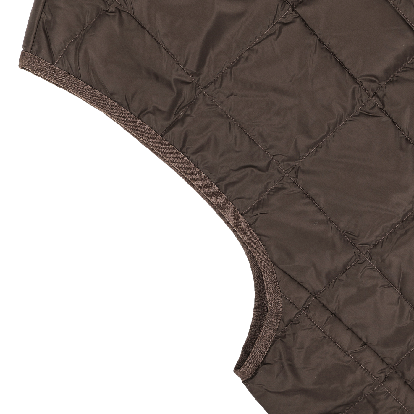 Close-up of a quilted fabric from Taion's Dark Chocolate Nylon Down Padded Vest, featuring a diagonal crosshatch pattern that resembles high-density nylon, highlighting the corner of the material.