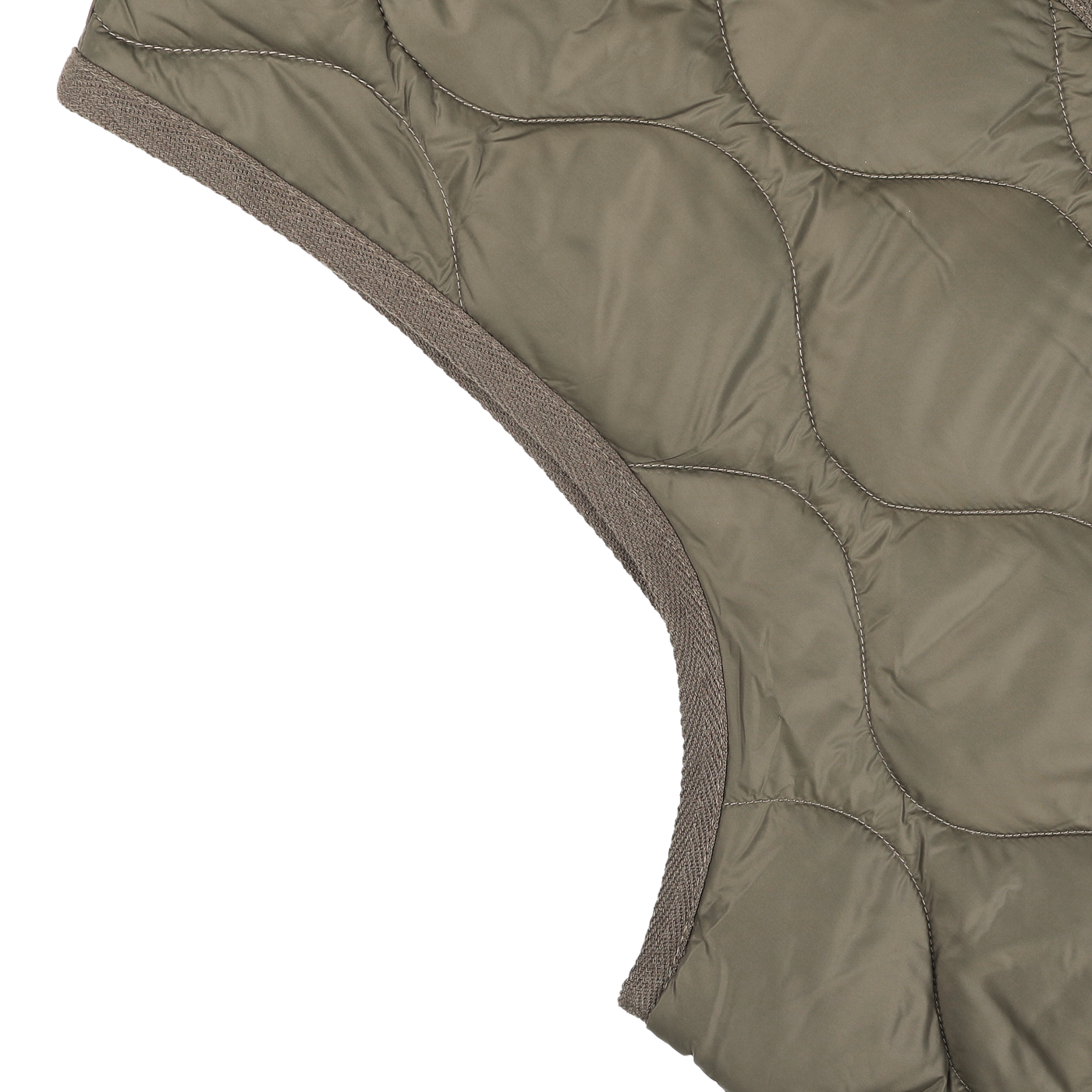 A close-up of the Taion Dark Olive Nylon Down Padded Zip Vest showcases its quilted, olive-green fabric made from high-density nylon with circular stitching. The edges are trimmed with brown fabric, enhancing the cozy feel of this luxurious garment piece.