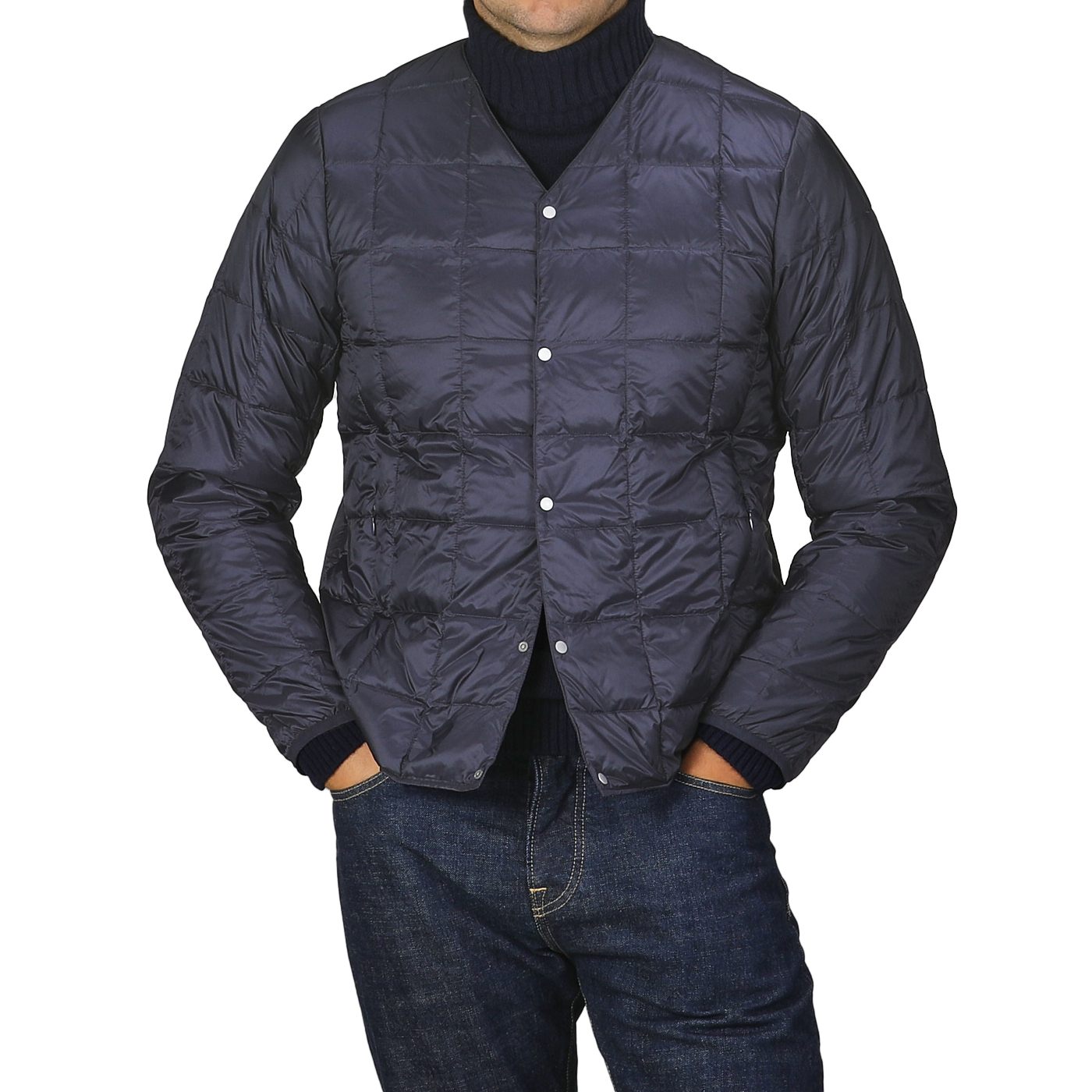 A person wearing the Navy Blue Nylon Down Padded Jacket by Taion, with arms relaxed, stands against a gray background.