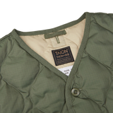 The back of a Taion Olive Green Nylon Down V-Neck Button Vest with a label on it, designed by a Japanese outerwear specialist.