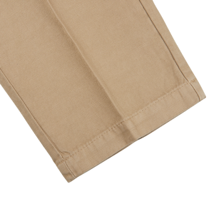 A pair of Beige Cotton Linen Duilio Trousers by Tela Genova, in tan color, on a white background.