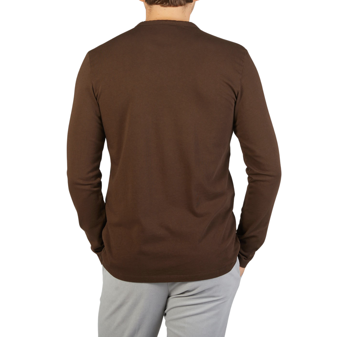 The back view of a man wearing a Tela Genova Dark Brown Organic Cotton LS T-Shirt, showcasing heritage clothing.