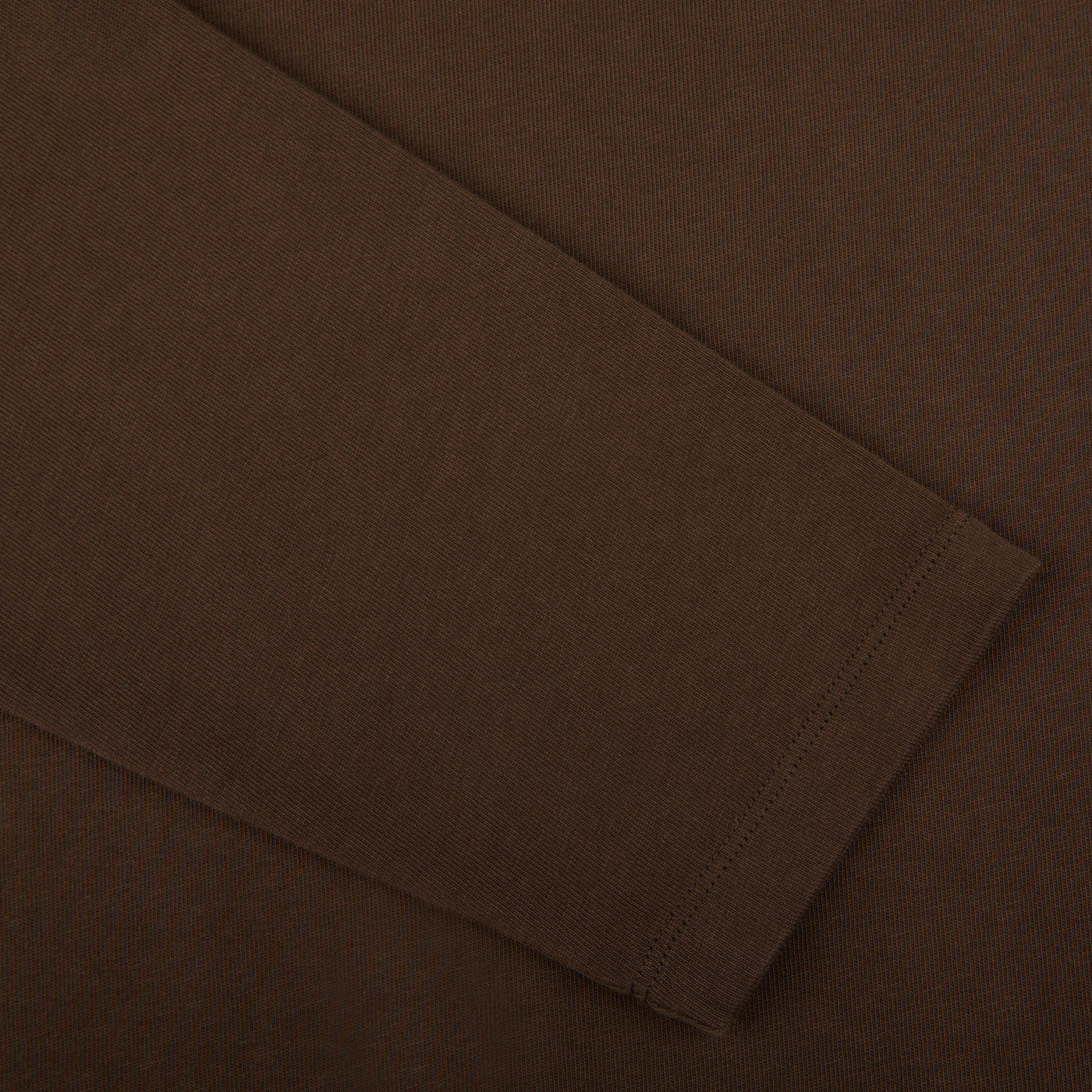A close up of a Dark Brown Organic Cotton LS T-Shirt by Tela Genova.