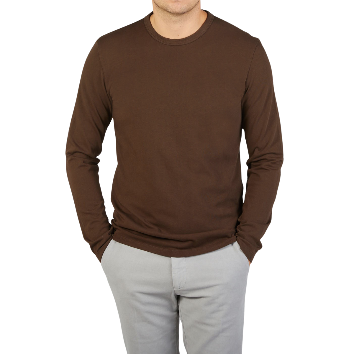 A man wearing a Tela Genova Dark Brown Organic Cotton LS T-Shirt.