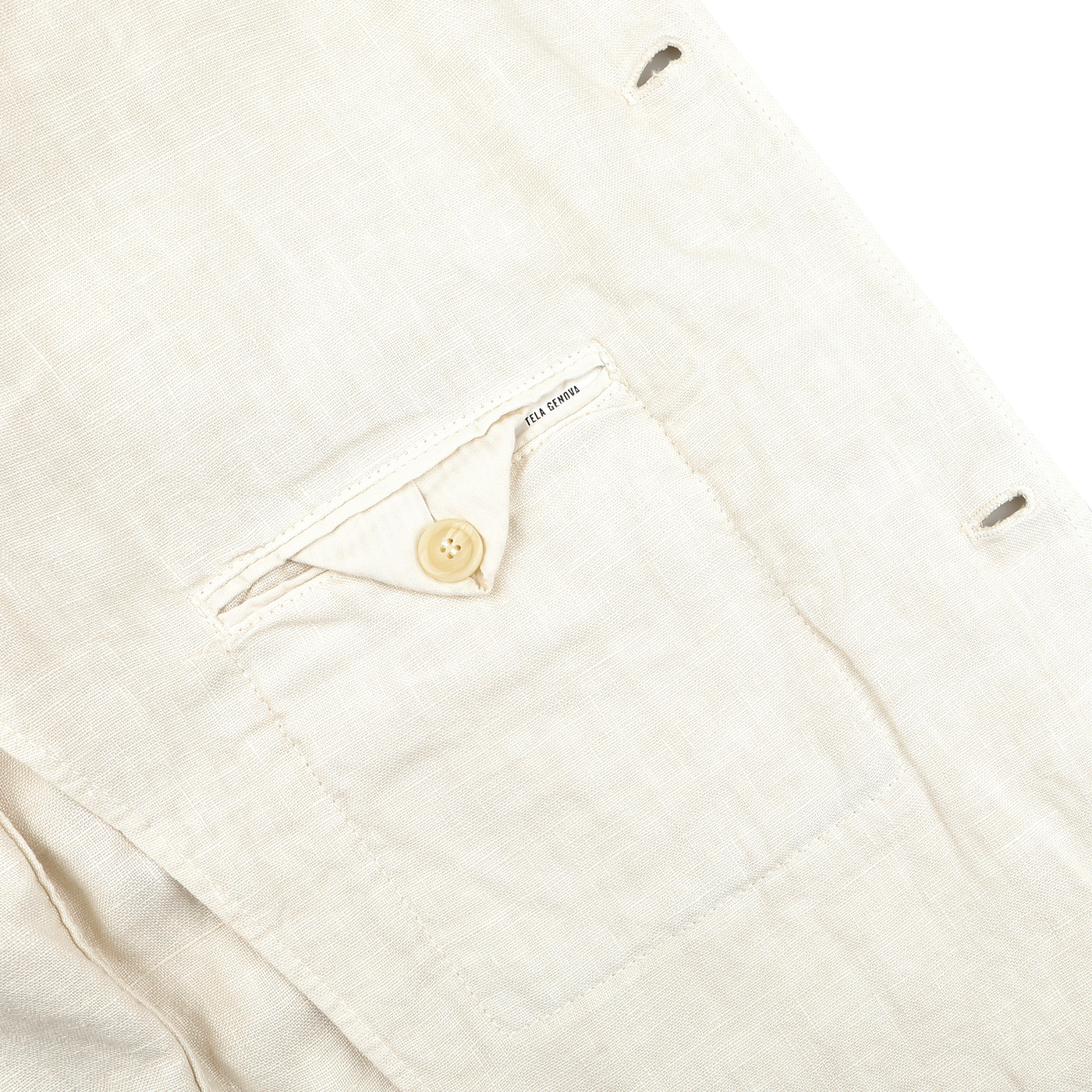 Close-up of the Ecru Pure Linen Camillo Jacket by Tela Genova, highlighting the fabric and a pocket with button closure and visible stitching for a textured, casual appearance.