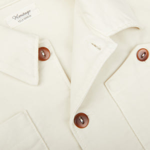 A close up of a Ecru White Brushed Cotton Leo Overshirt by Tela Genova with buttons.