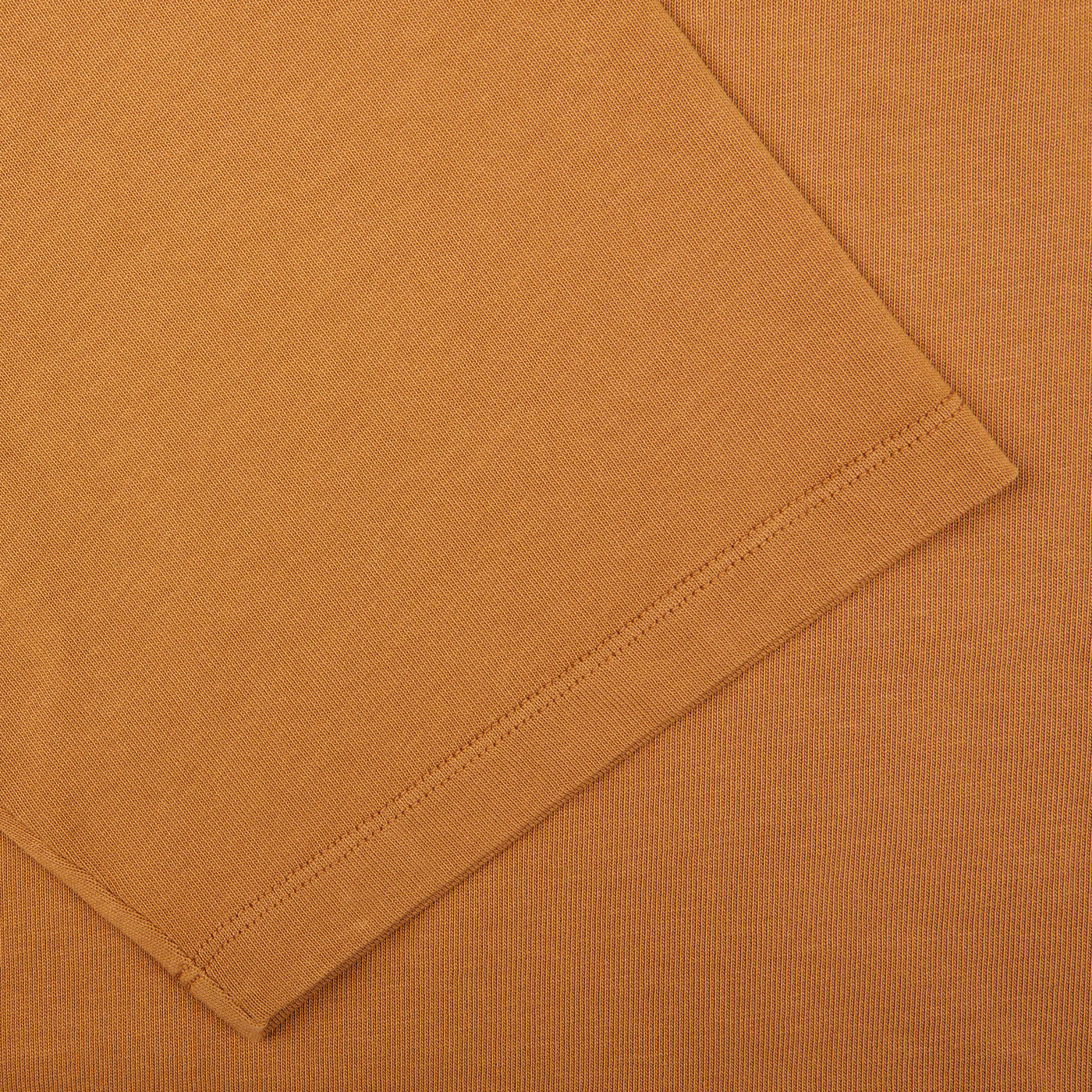 Brick Orange Heavy Organic Cotton T-Shirt with a detailed texture and neatly stitched edge, crafted from Tela Genova.