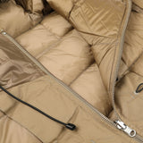 Close-up of a beige nylon down padded liner hood jacket by Ten C, featuring a partially open zipper and a black drawstring.