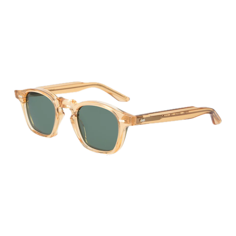 Bio-based, transparent-framed Cord Eco Champagne Green Lenses 44mm sunglasses by The Bespoke Dudes against a black background.