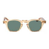 A pair of Cord Eco Champagne Green Lenses 44mm sunglasses by The Bespoke Dudes, with a translucent frame and green lenses, isolated on a black background.