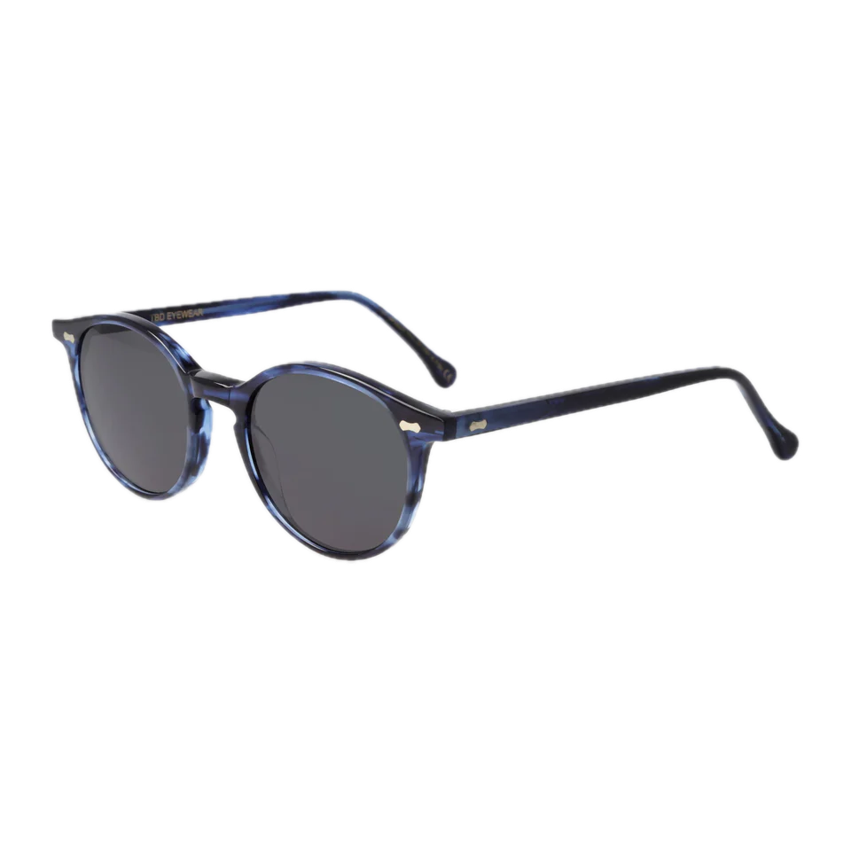 A pair of The Bespoke Dudes sunglasses with a bio acetate frame and Cran Ocean Blue Grey Lenses 49mm against a black background.