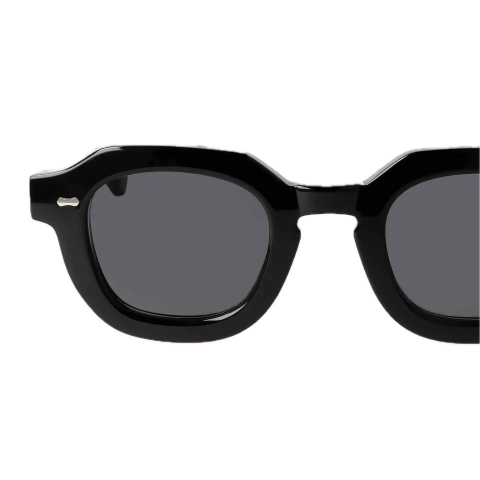 Juta Eco Black Grey Lenses 46mm sunglasses with thick frames by The Bespoke Dudes isolated on a black background.