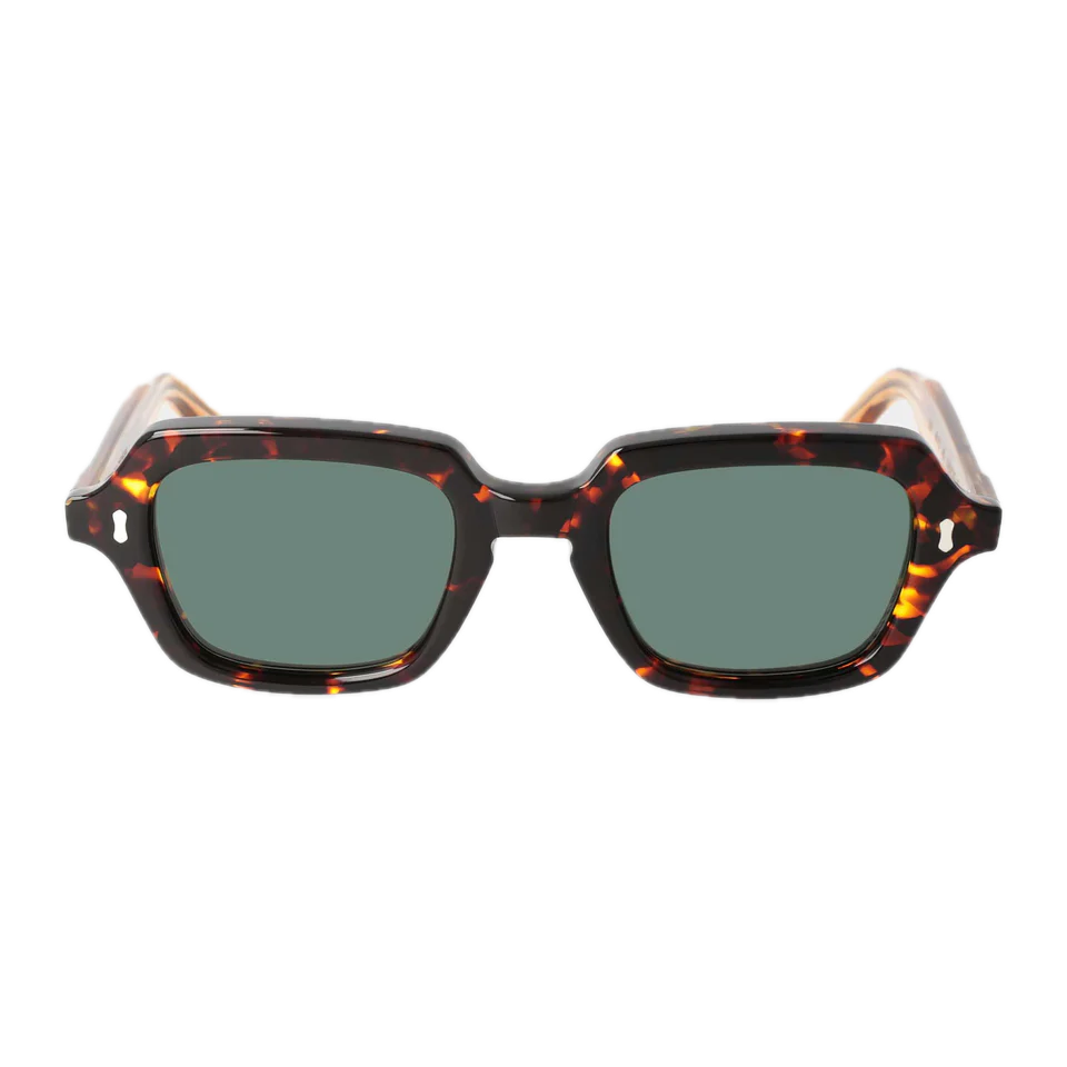 A pair of square-shaped tortoiseshell sunglasses with dark green lenses, isolated on a black background by The Bespoke Dudes.
