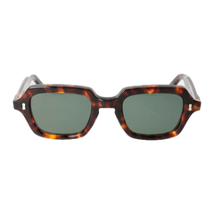 A pair of Oak Eco Spotted Havana sunglasses with square-shaped frames and green-tinted lenses, isolated on a black background by The Bespoke Dudes.