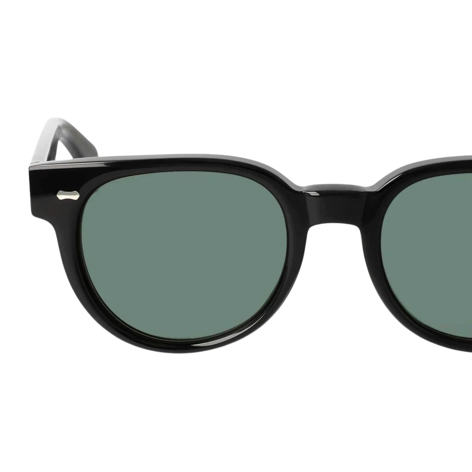 Close-up of Palm Eco Black Green Lenses 51mm sunglasses by The Bespoke Dudes against a white background.